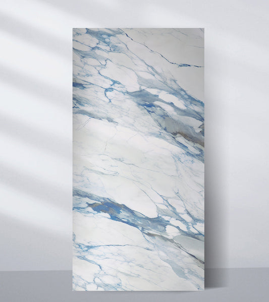 3D Bluewave PVC marble sheet with white base and flowing blue veining for modern wall decor