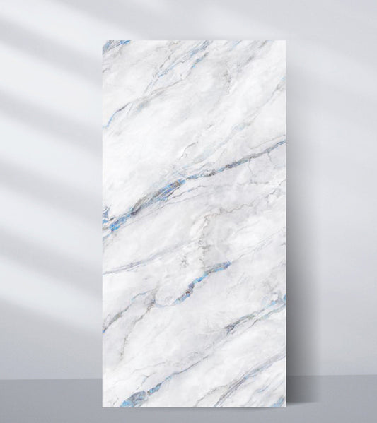 White PVC marble sheet with subtle blue and gray veining for modern interior wall decor