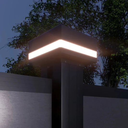 LED lighted fence post cap installed on composite fence post for modern outdoor lighting