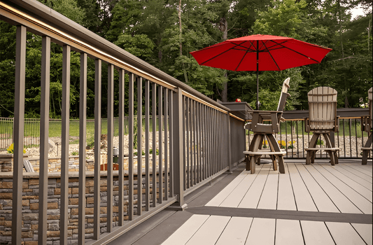 Durable brown composite railing on a low-maintenance deck surrounded by trees in New Jersey