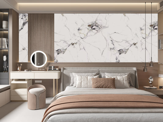 Luxury marble veneer wall panels with seamless book-match design behind modern bedroom headboard