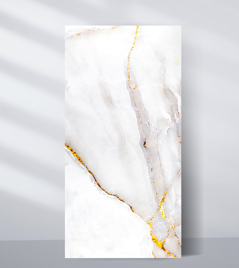 White marble texture wall panel with soft gray patterns and gold veining for luxury interiors