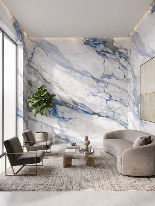Calacatta Azur marble-look PVC wall panels installed in a modern living room with bold blue-gray veining