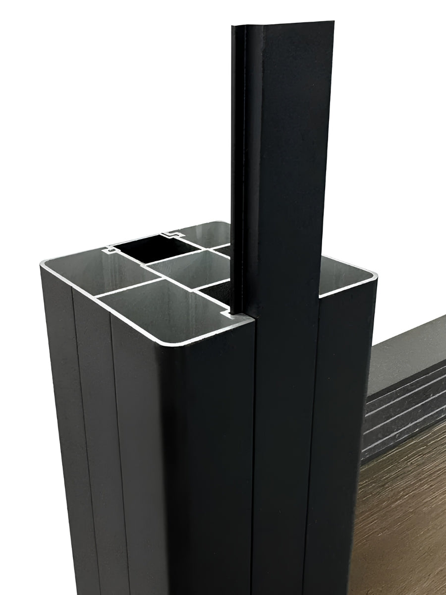 Close-up of a fence panel slat fitted into the black post channel