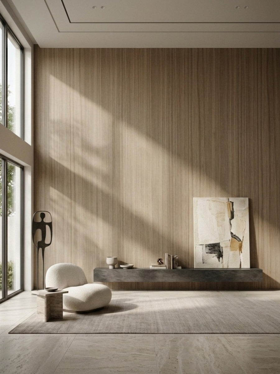 Tall ash wood veneer feature wall with vertical grain in a minimalist living space