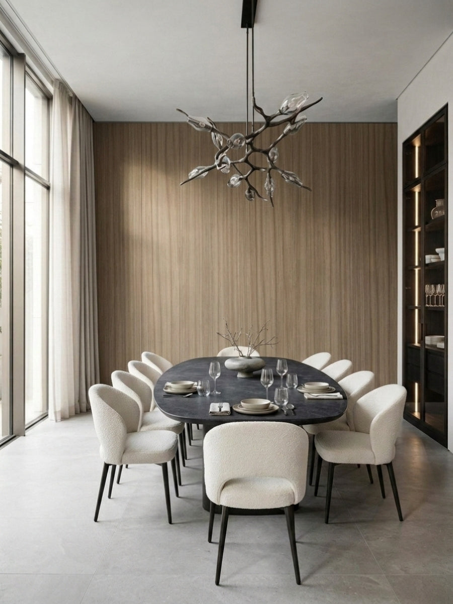 Ash wood veneer wall panels creating a warm vertical-grain backdrop in a modern dining room