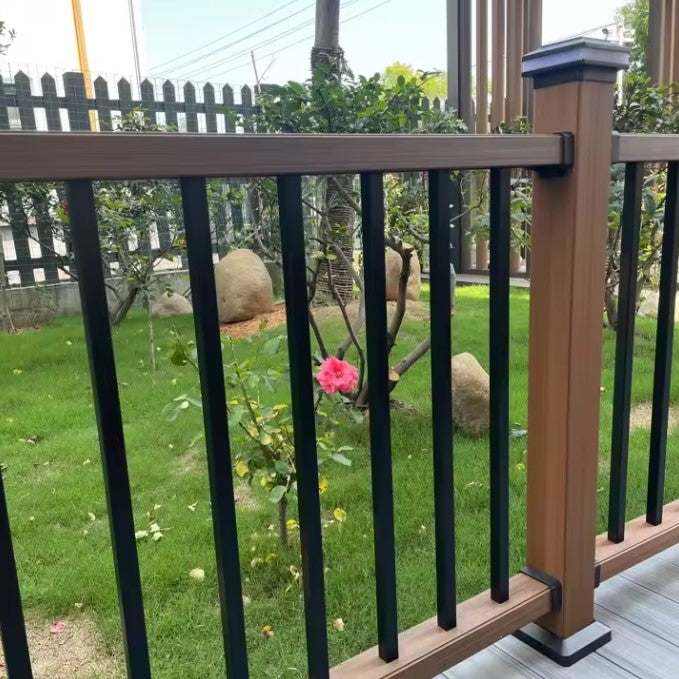 Backyard Deck Railing brown composite deck railing with black balusters in garden