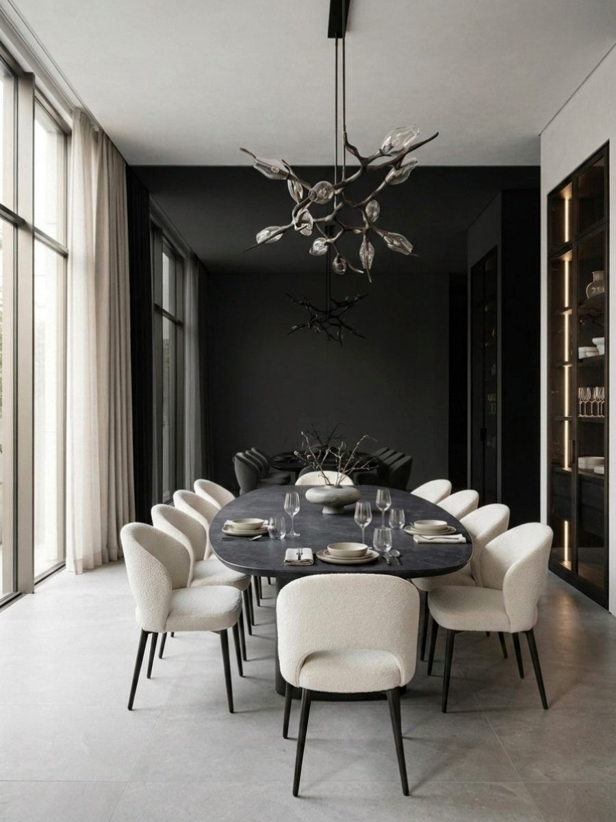 Black Mirror wood veneer panel accent wall behind a modern dining table and upholstered chairs