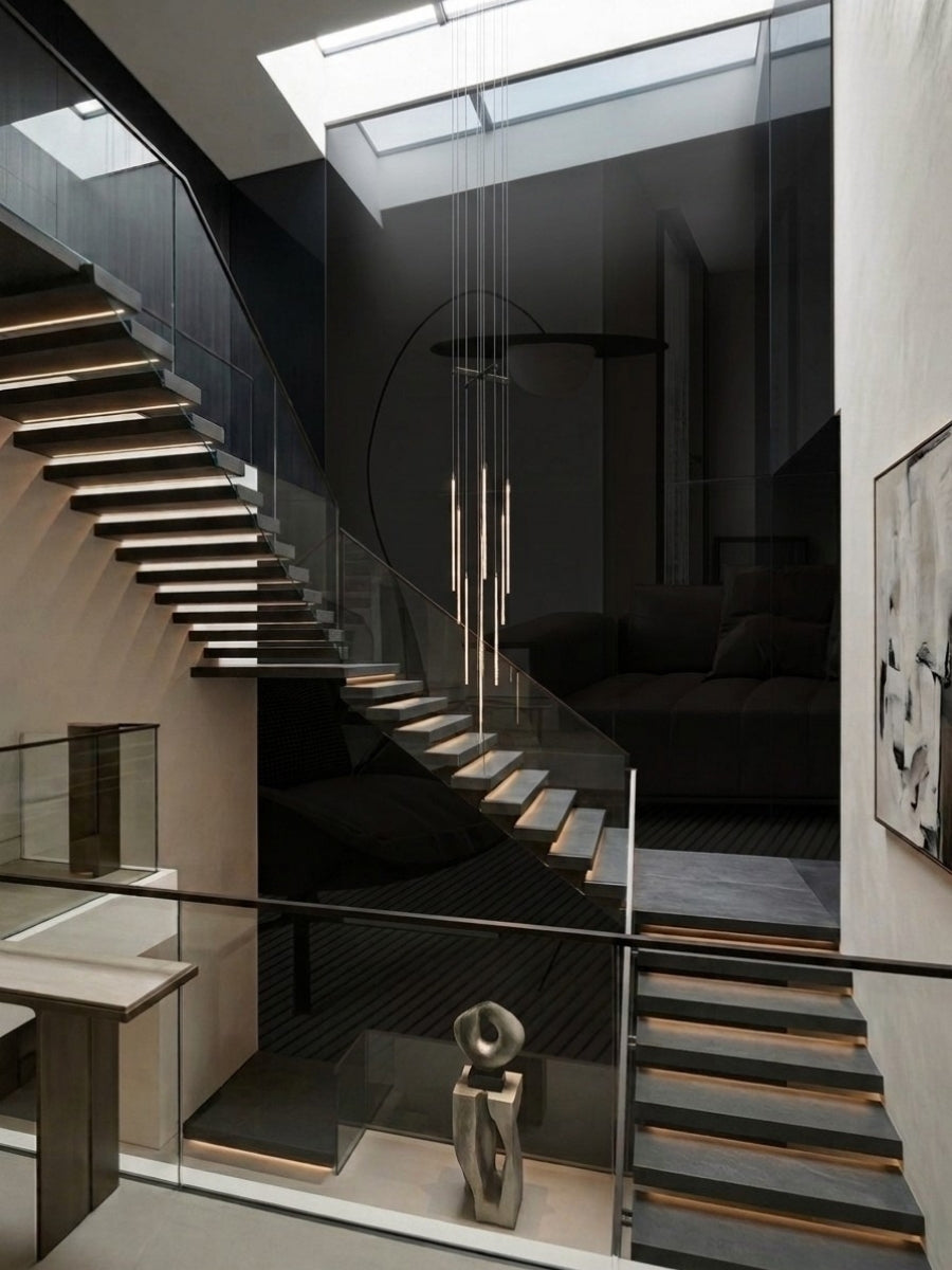 Glossy Black Mirror wood veneer panels lining a dramatic stairwell with floating illuminated steps