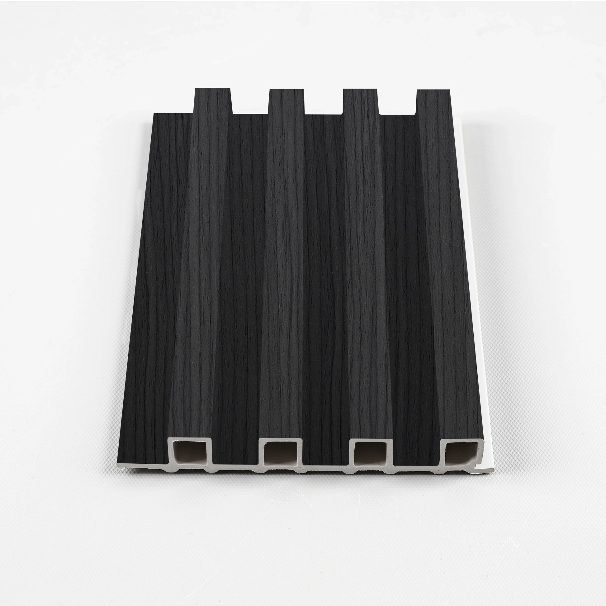 Black Timber WPC fluted 3D wall panel sample with modern wood texture