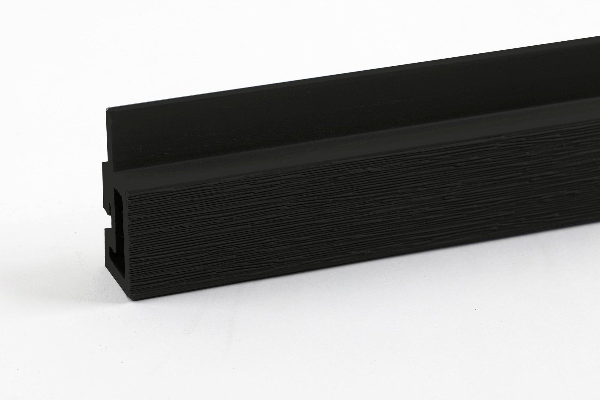 Black composite L trim for exterior siding edges and corner finishing