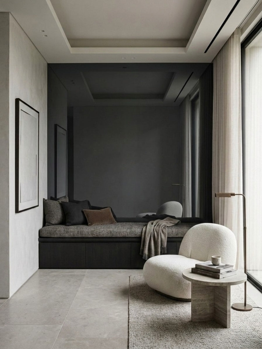 Gray mirror wood veneer panel feature wall in a minimalist lounge with a window seat