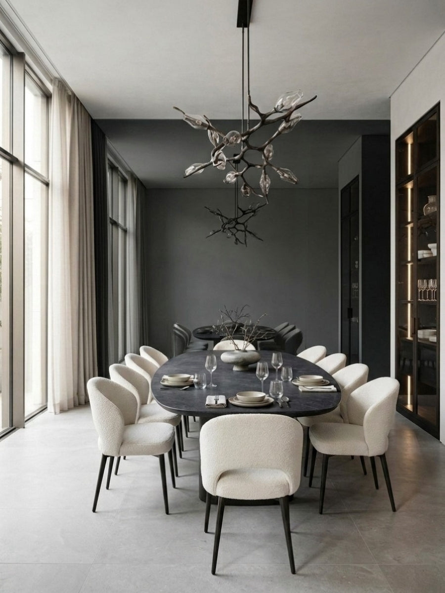Gray mirror wood veneer panels creating a reflective wall in a contemporary dining room