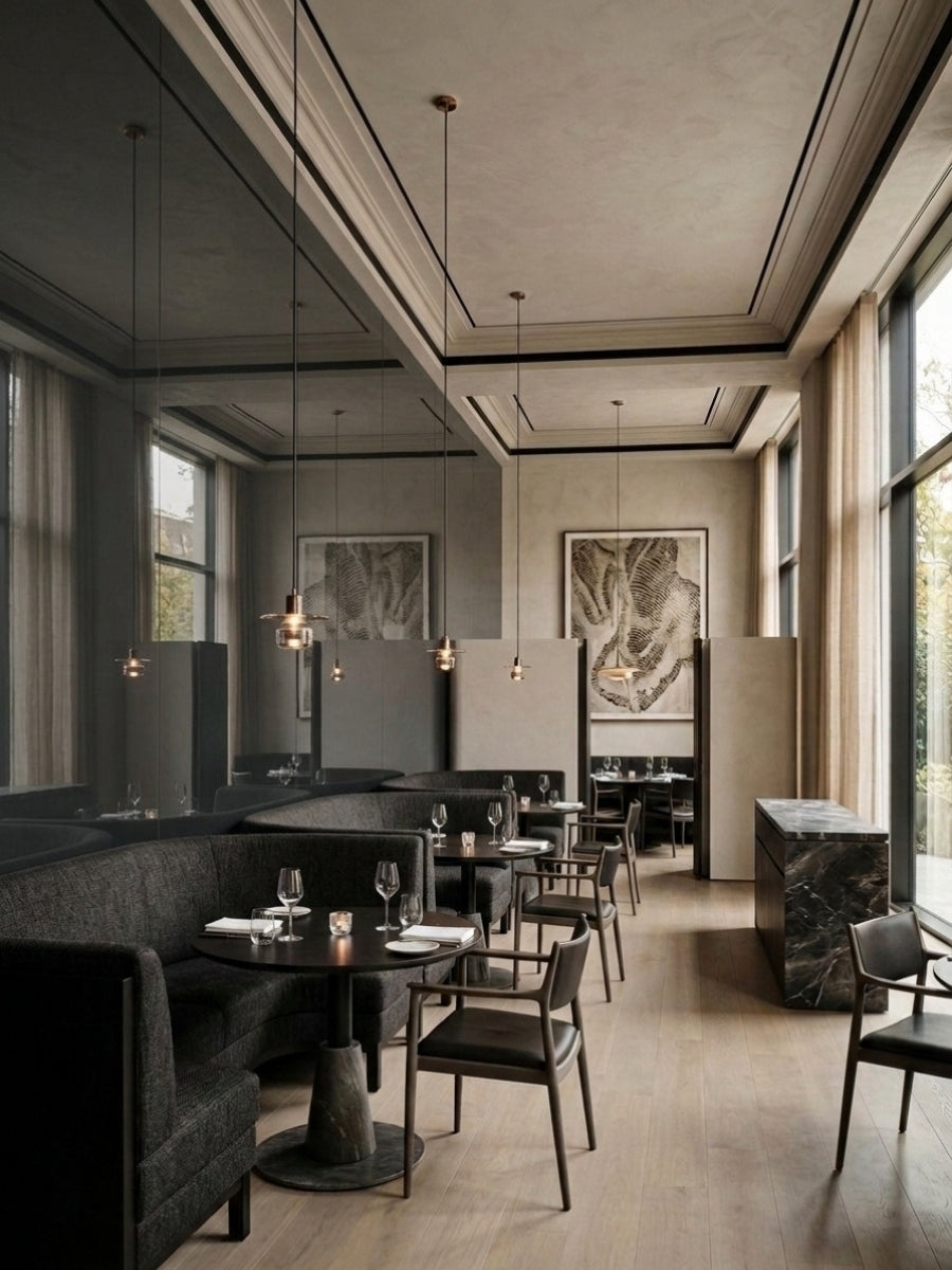 Gray mirror wood veneer panel wall reflecting pendant lights and seating in an elegant restaurant interior