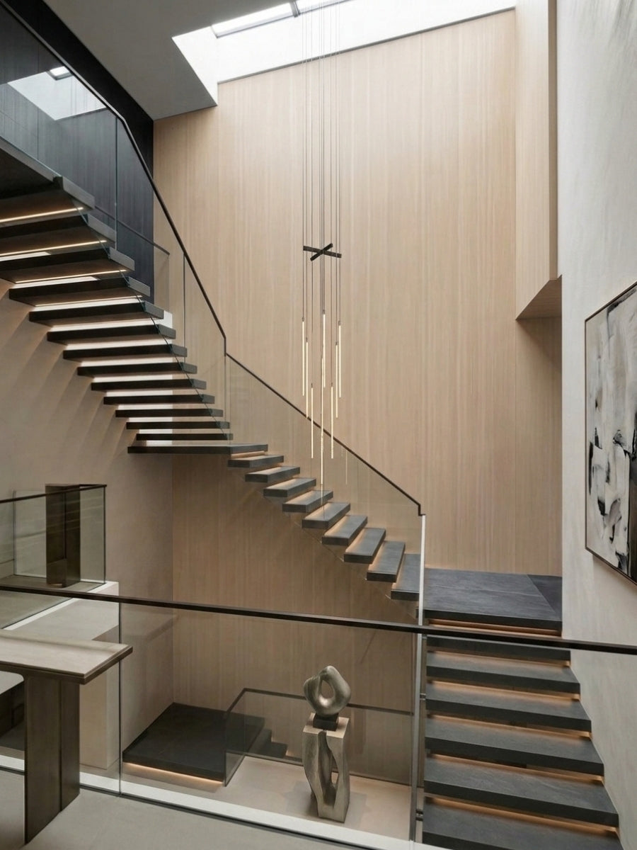 Tall stairwell clad in pale Nordic birch wood veneer panels with subtle vertical grain