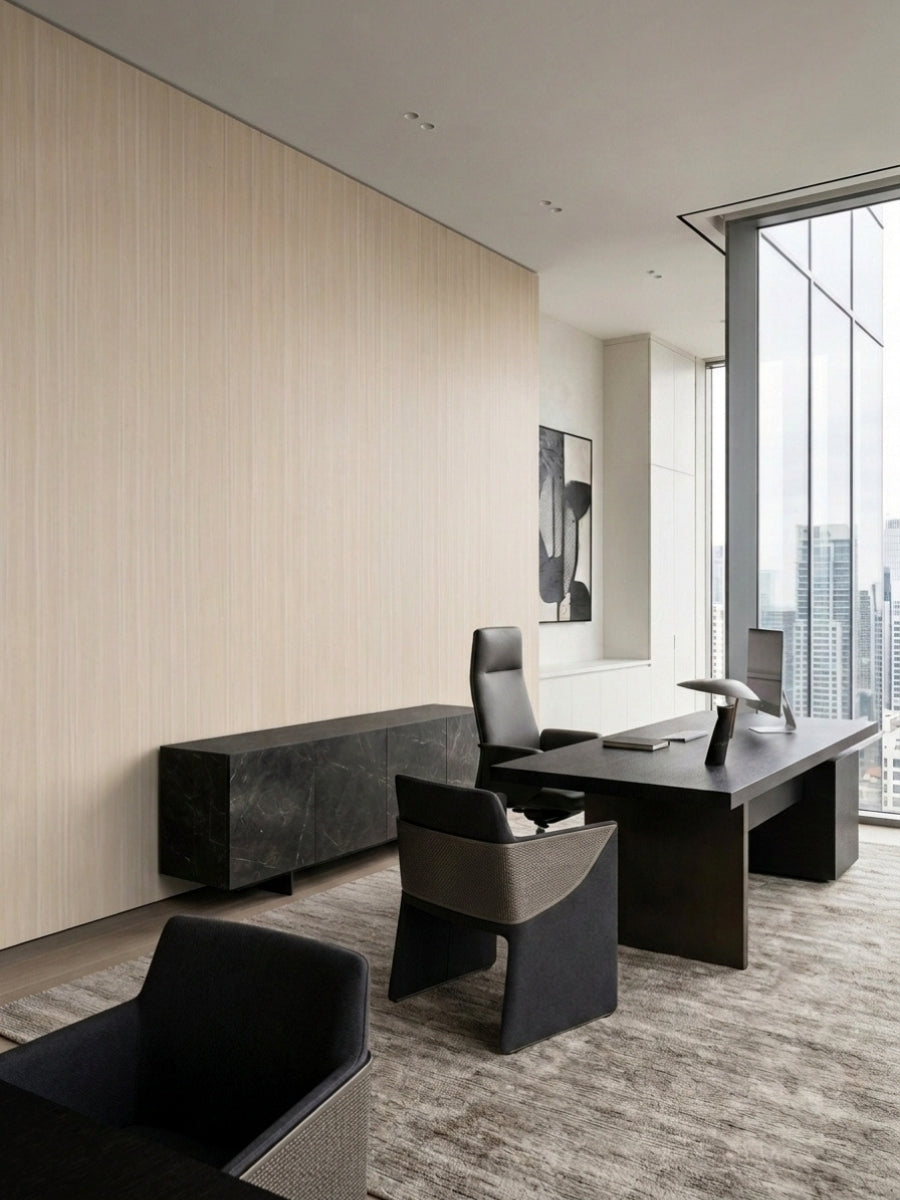 Modern high-rise office with a Nordic birch wood veneer panel wall behind a dark desk