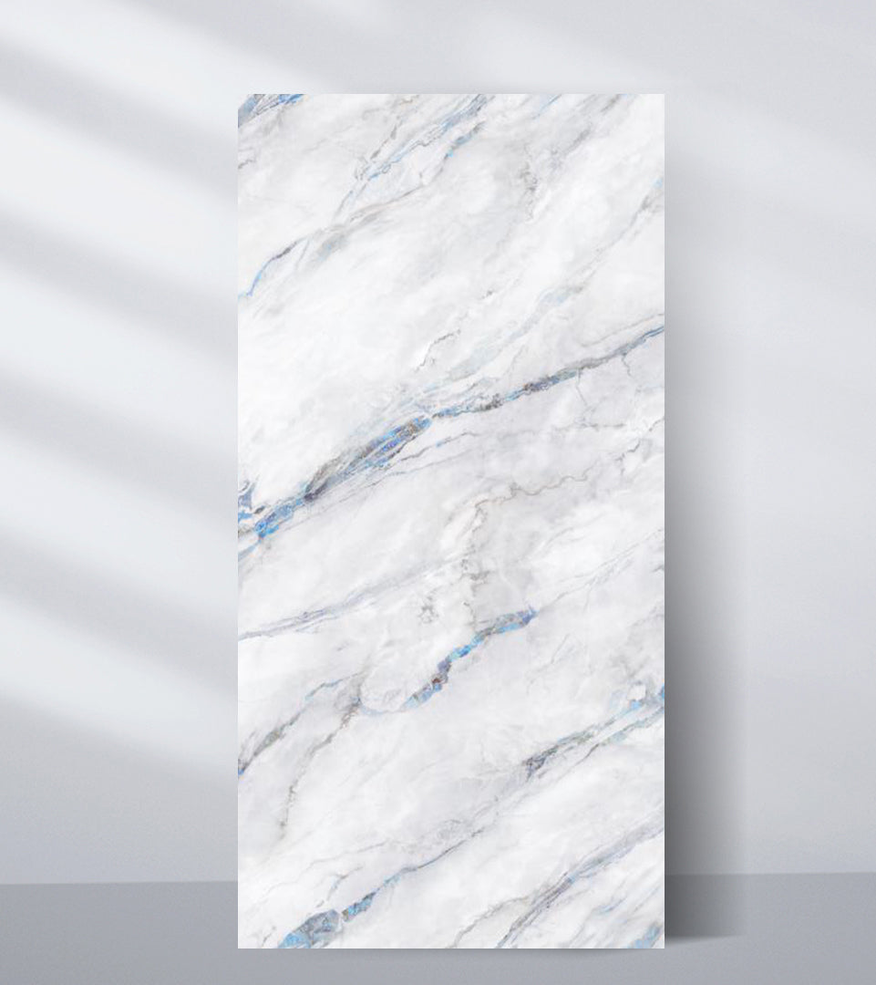 White marble wall panel with soft gray and blue veining for modern interior décor