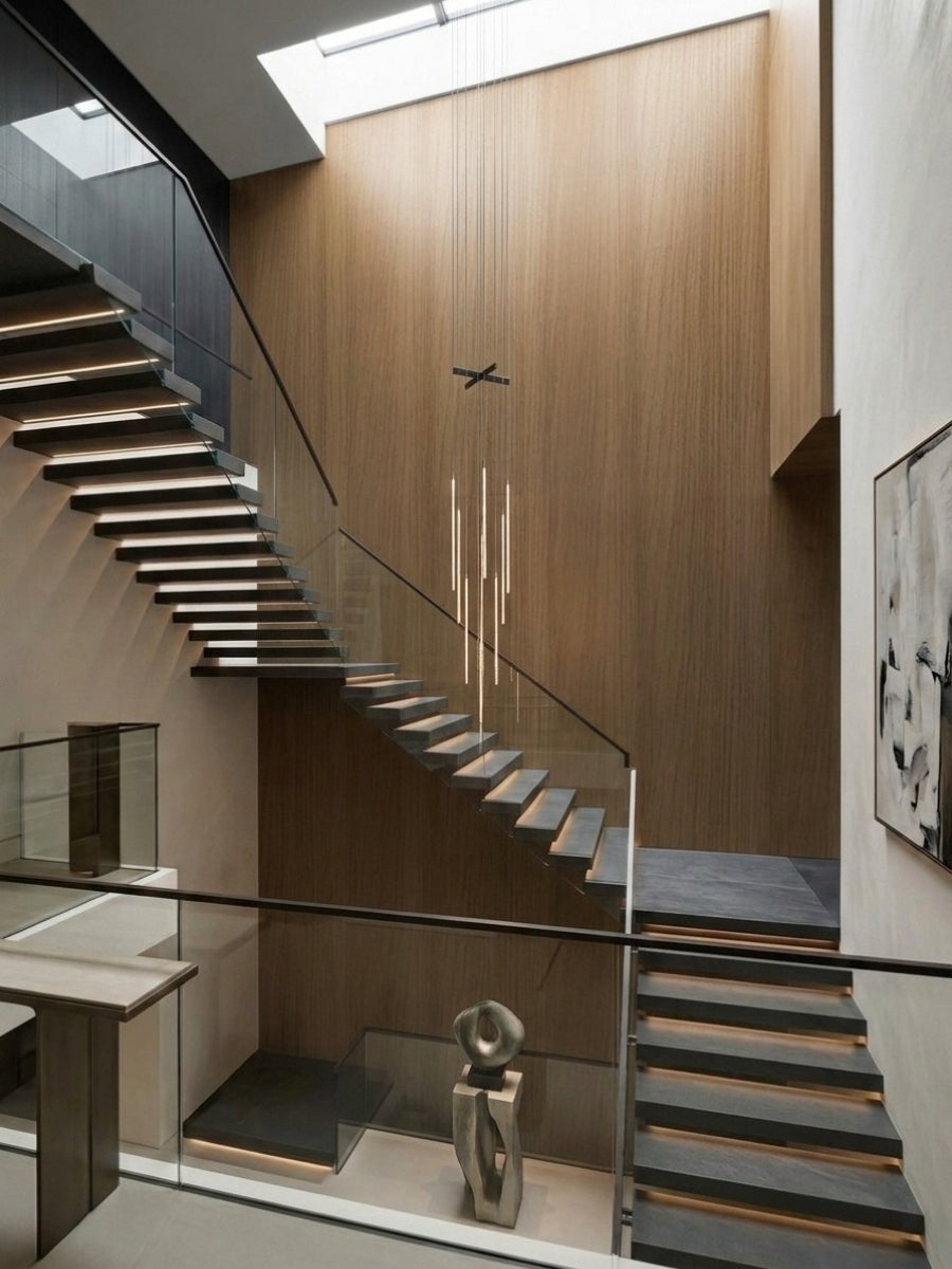 Tall Royal Oak wood veneer panel installation beside a floating staircase in a modern atrium