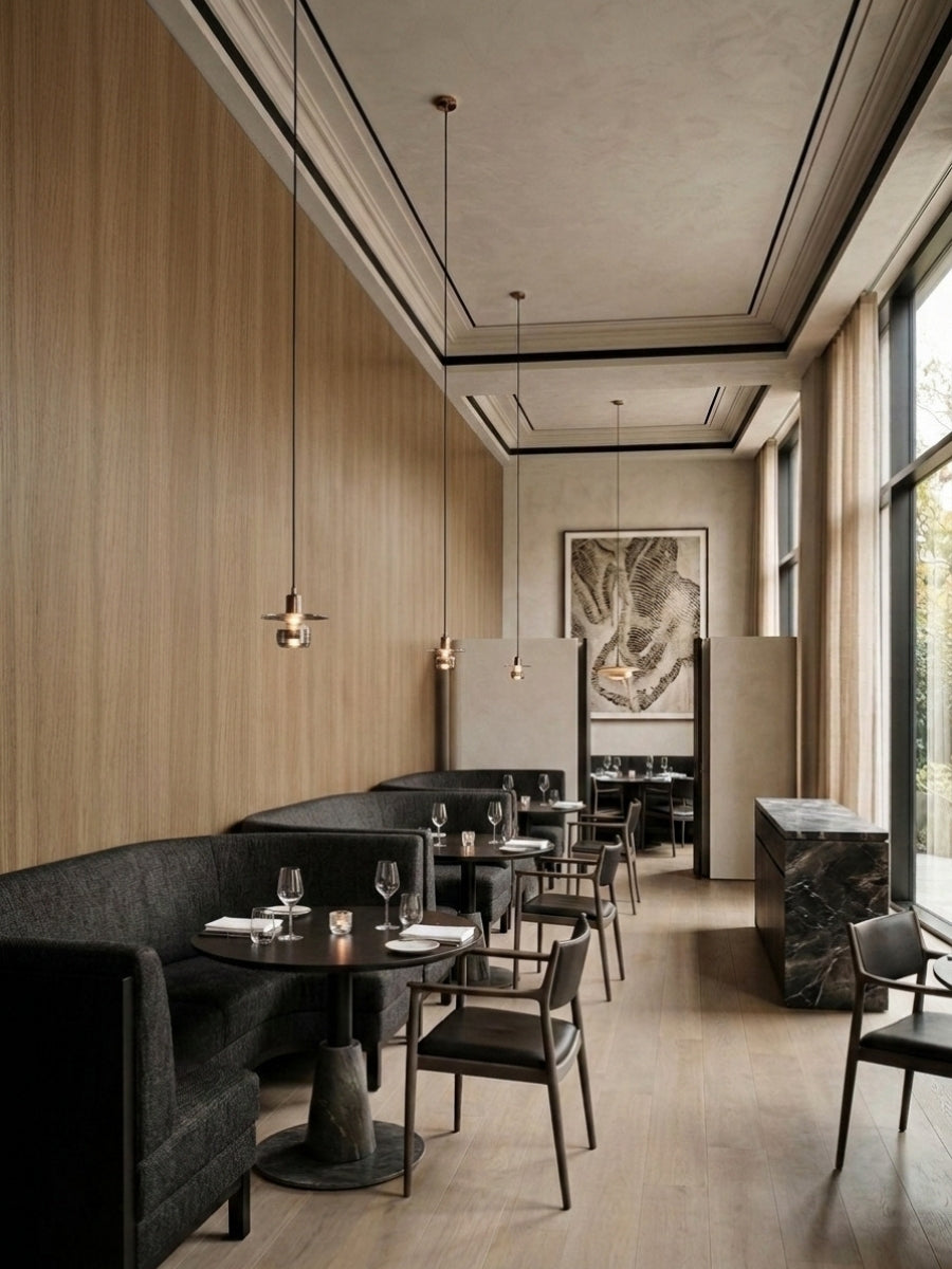 Royal Oak wood veneer panels lining a restaurant wall with banquette seating and pendant lights