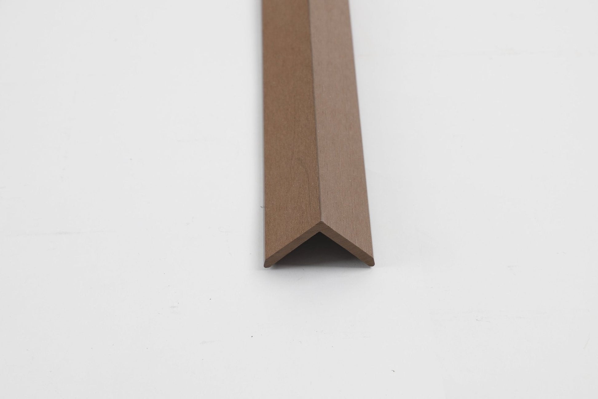 Brown composite corner trim for exterior wall panels and cladding