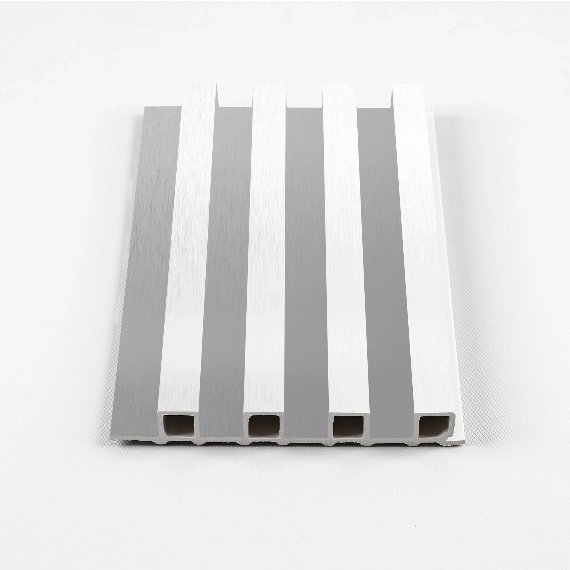 White Brushed Modern WPC fluted wall panel sample with vertical grooves