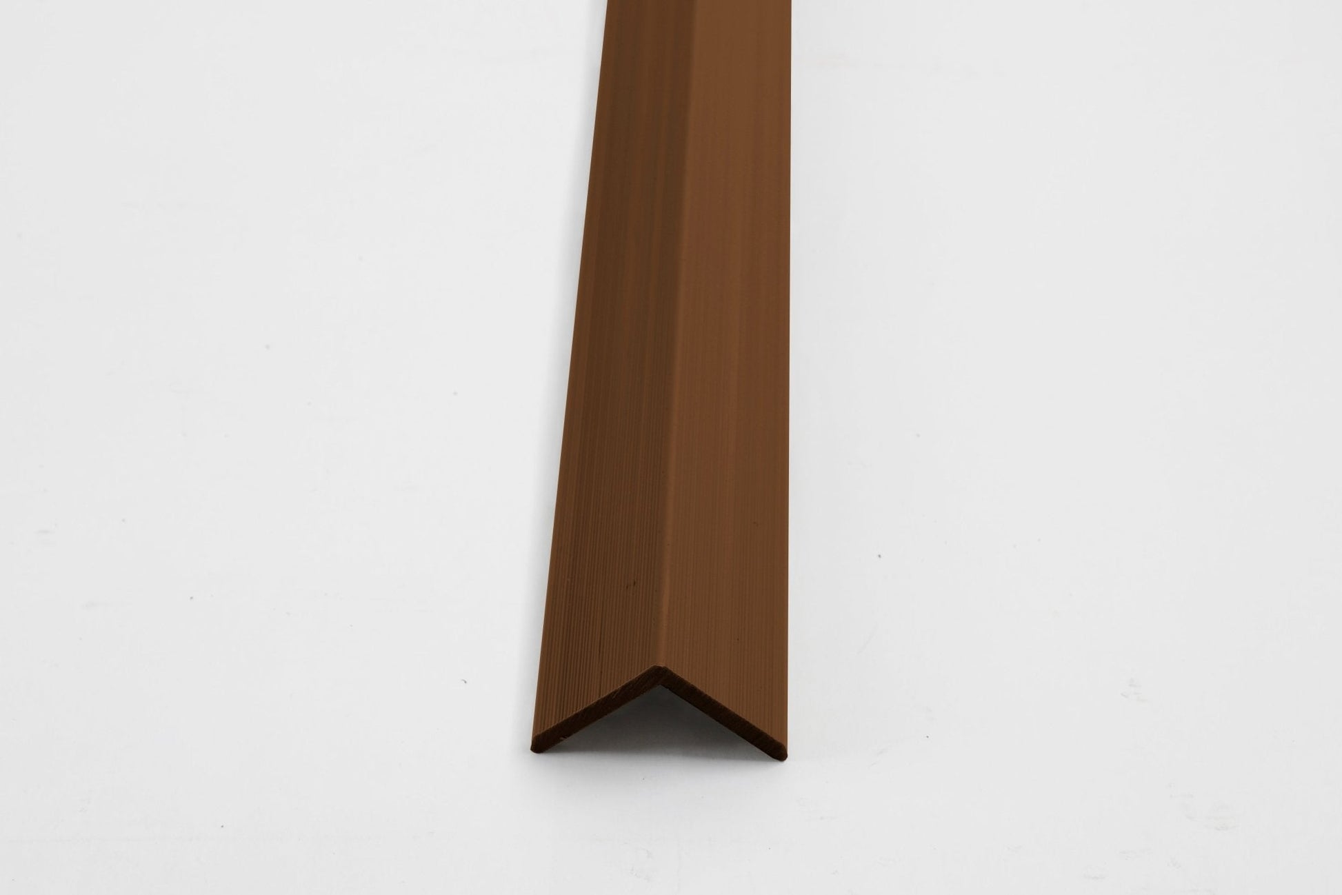 Brown aluminum corner trim for exterior wall panels and composite cladding