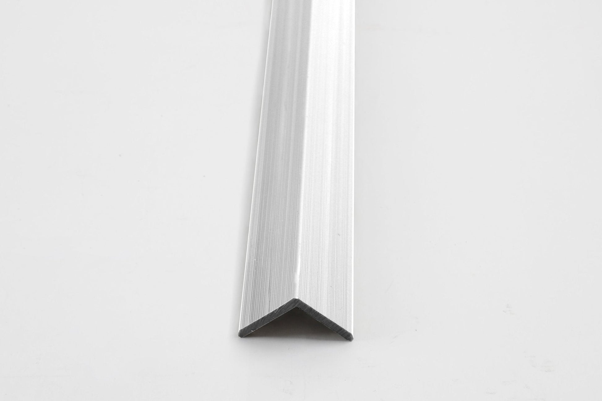 Aluminum corner trim for exterior wall panels and composite cladding